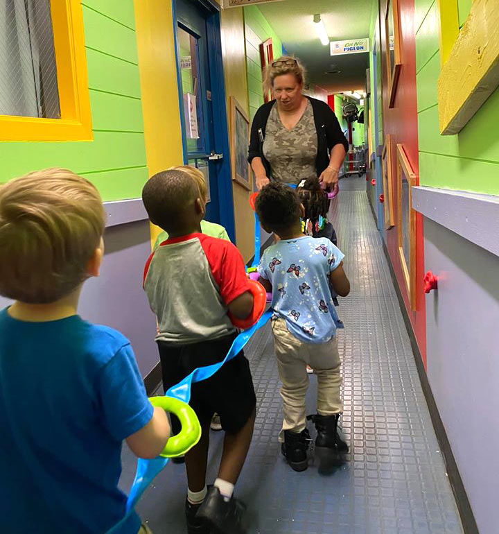 Children walking down the hall at Robin's Nest Learning Center in Carbondale, Illinois