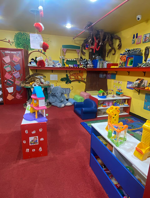 Children playing on jungle gym at Robin's Nest Learning Center in Carterville, Illinois