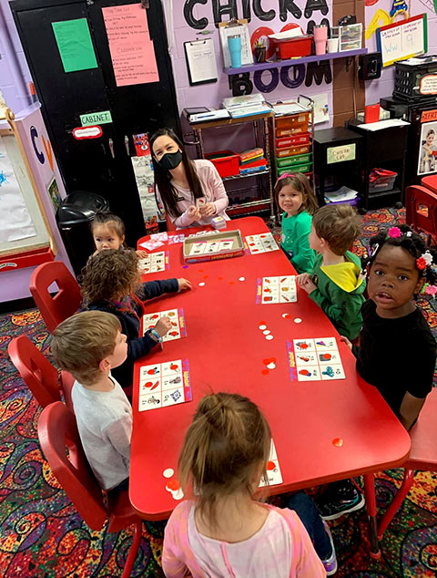 PreSchool - Teacher with students at Robins Nest Learning Center