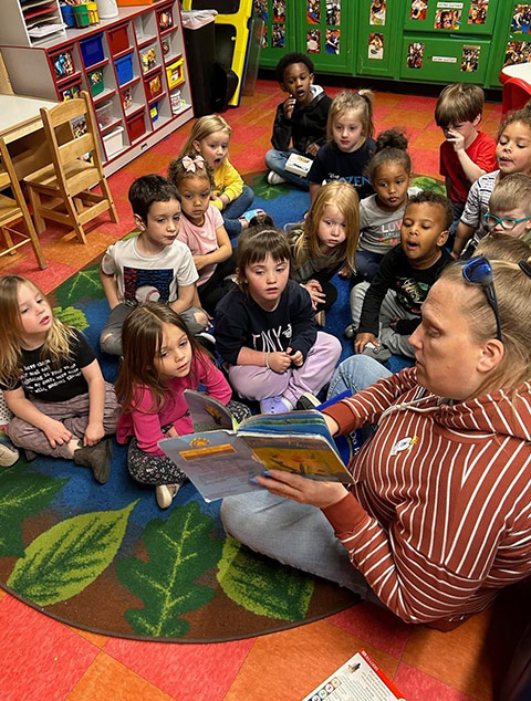 PreSchool - Teacher with students at Robins Nest Learning Center