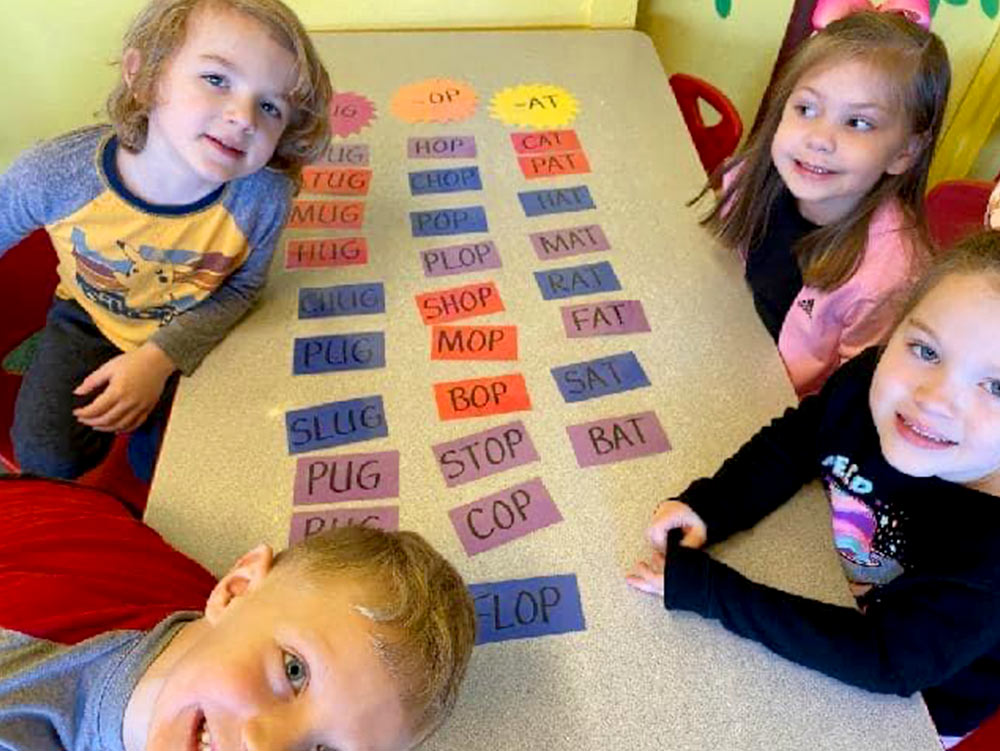 Pre-K Advanced - Kids learning words at Robins Nest Learning Center