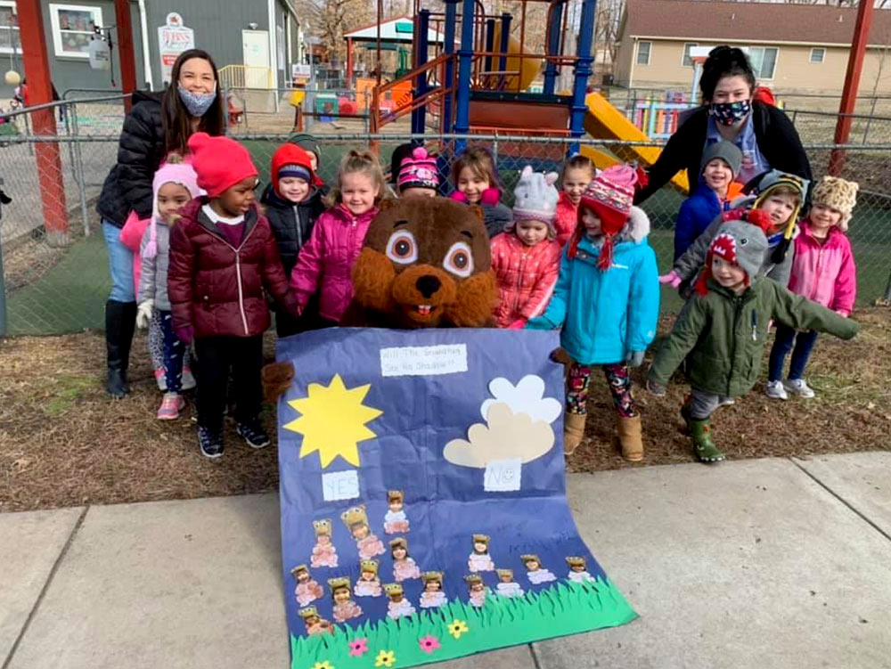 Pre-K Advanced - Kids with groundhog at Robins Nest Learning Center