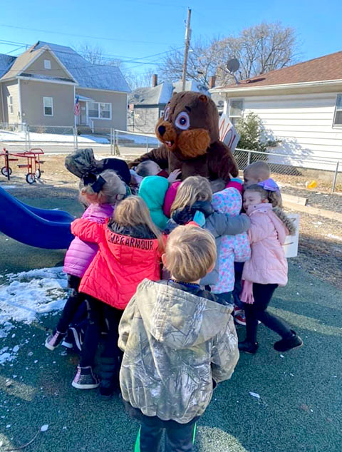 Pre-K Advanced - Kids with groundhog at Robins Nest Learning Center
