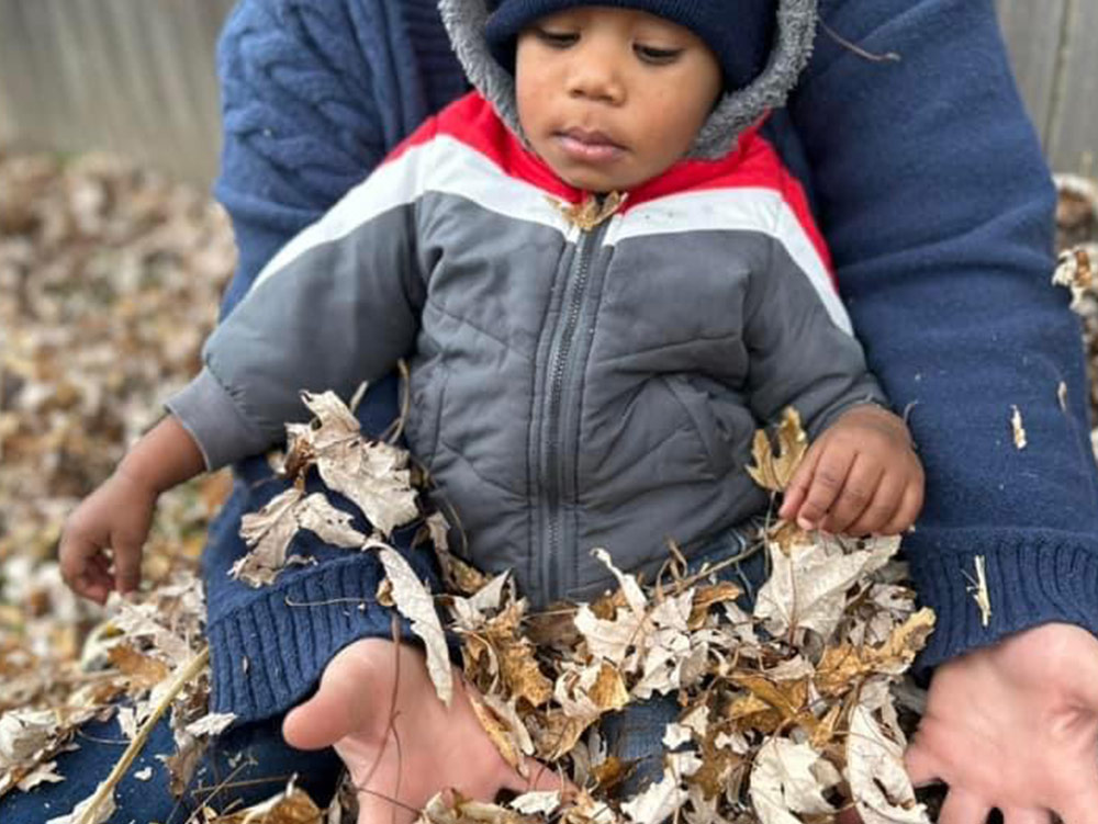 Toddlers Room - Kids playing outside Robins Nest Learning Center