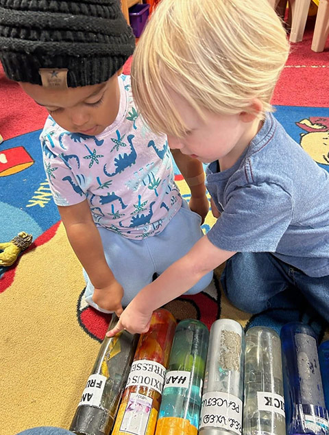 Toddlers Room - Kids playing Robins Nest Learning Center