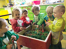 Toddlers Room - Kids playing Robins Nest Learning Center